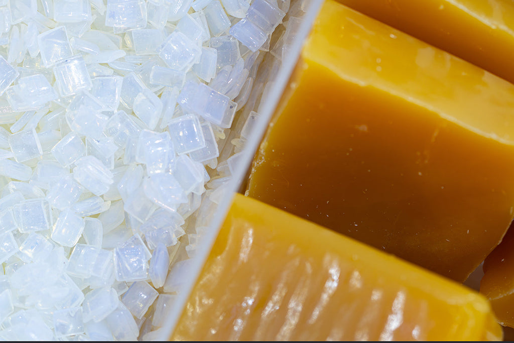 a close-up of pellet of hot melt and polymers