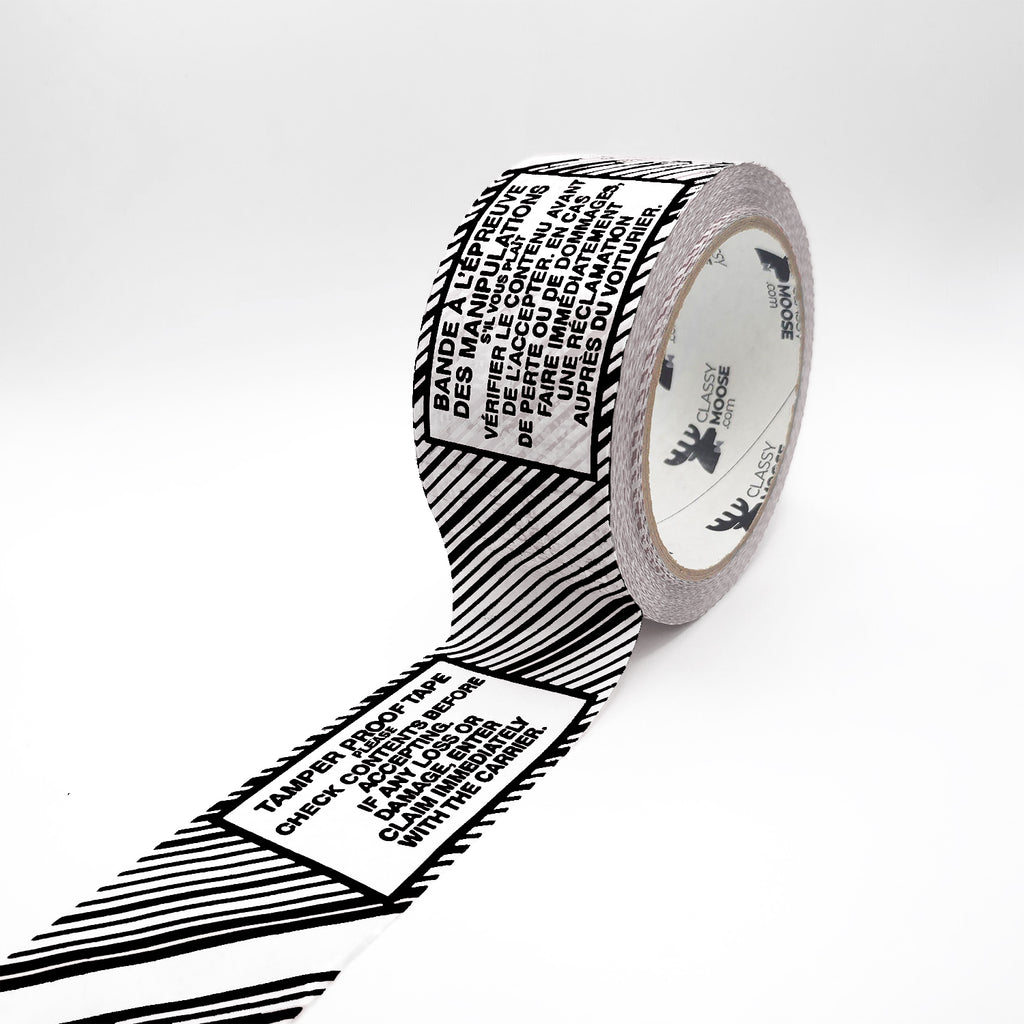 Roll of black and white tape with text on a white background