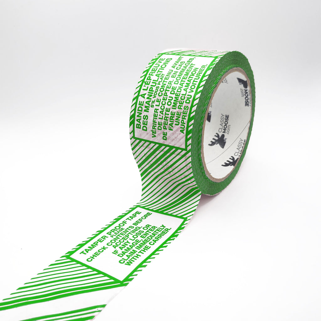 Roll of green and white tape with text on a white background