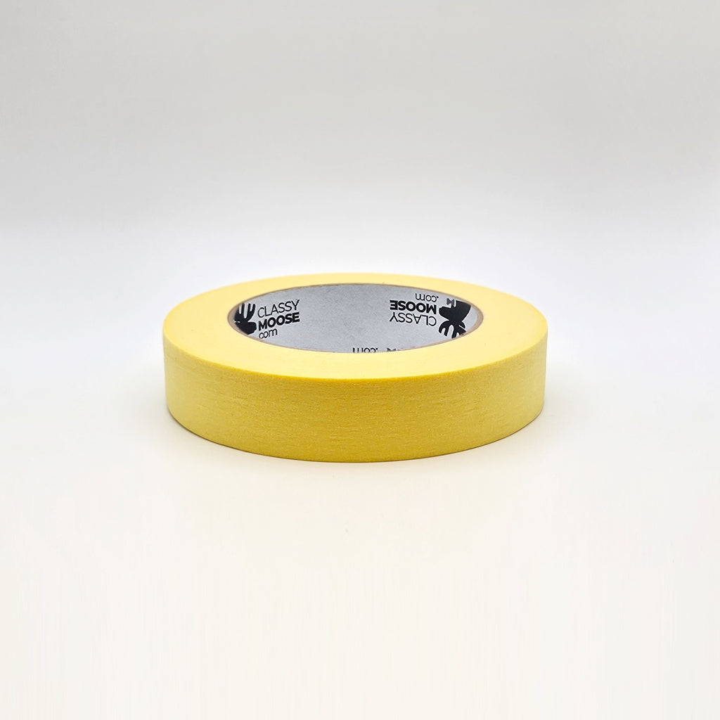 Yellow masking tape on a white background