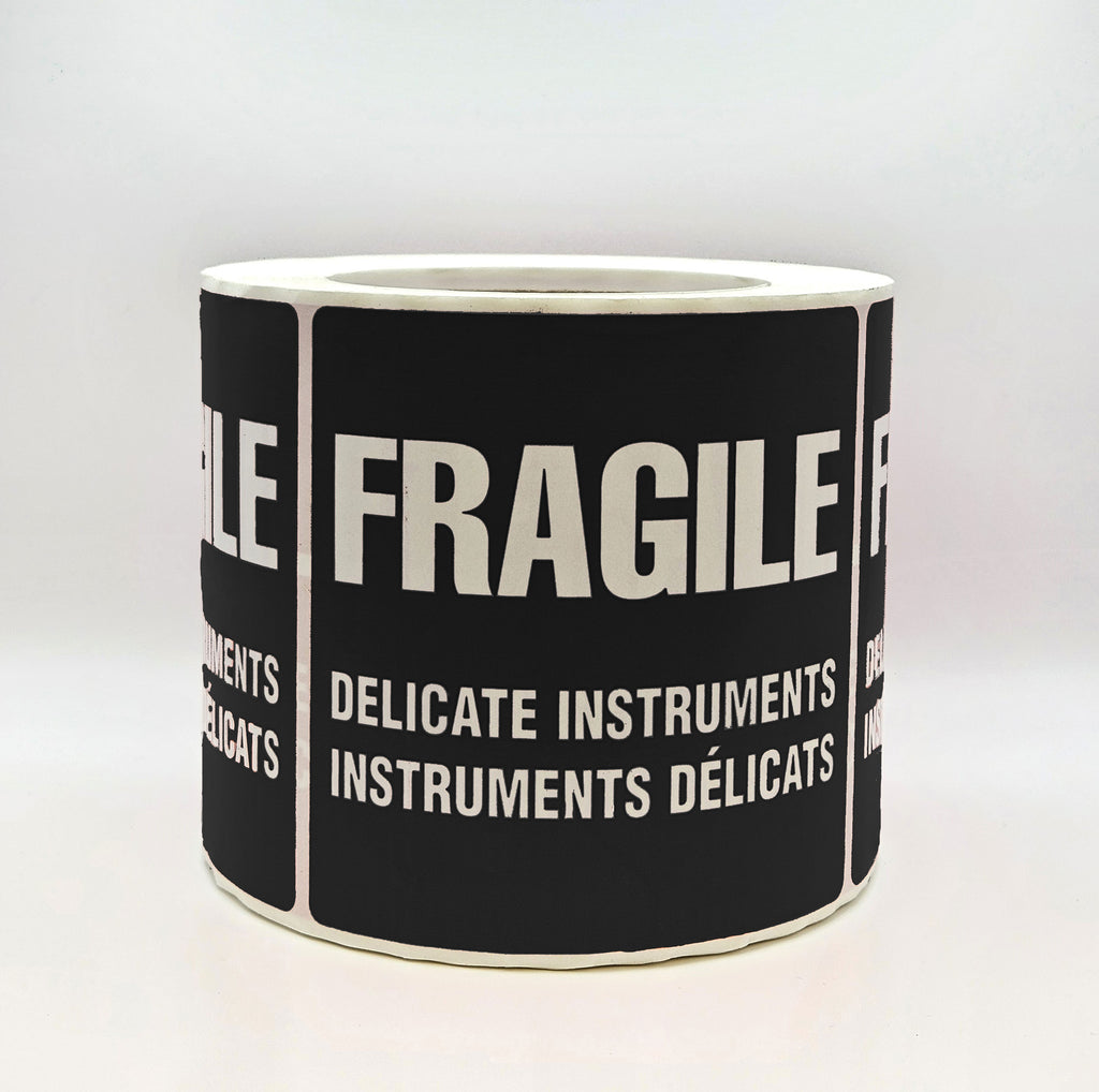 A black label with white text that reads 'FRAGILE DELICATE INSTRUMENTS' in both English and French. Side view