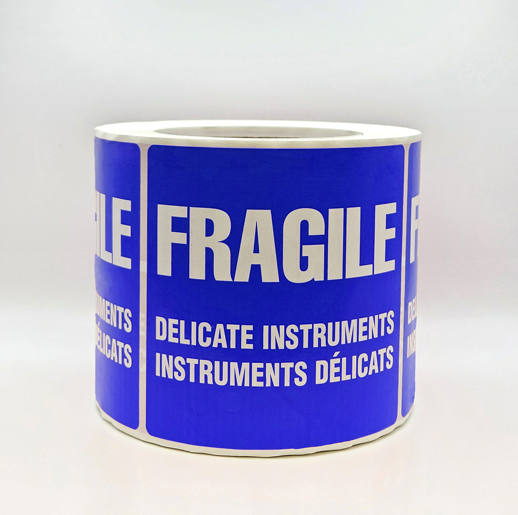 A blue label with white text that reads 'FRAGILE DELICATE INSTRUMENTS' in both English and French. Side view