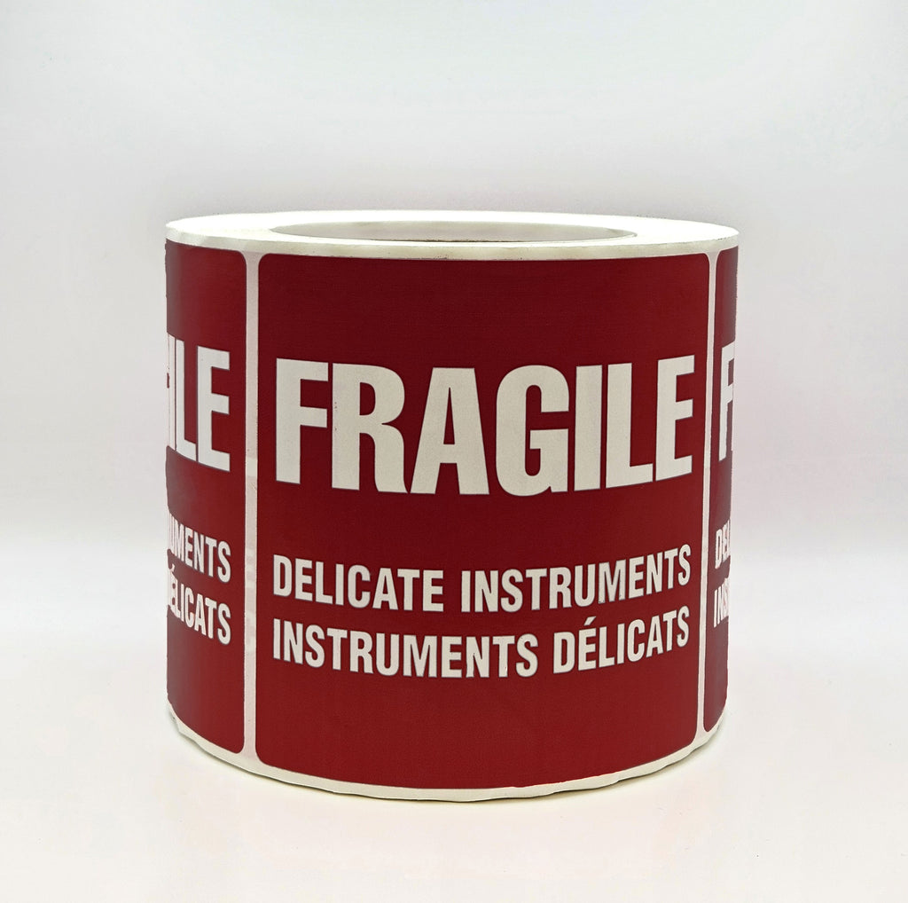 A burgundy label with white text that reads 'FRAGILE DELICATE INSTRUMENTS' in both English and French. Side view