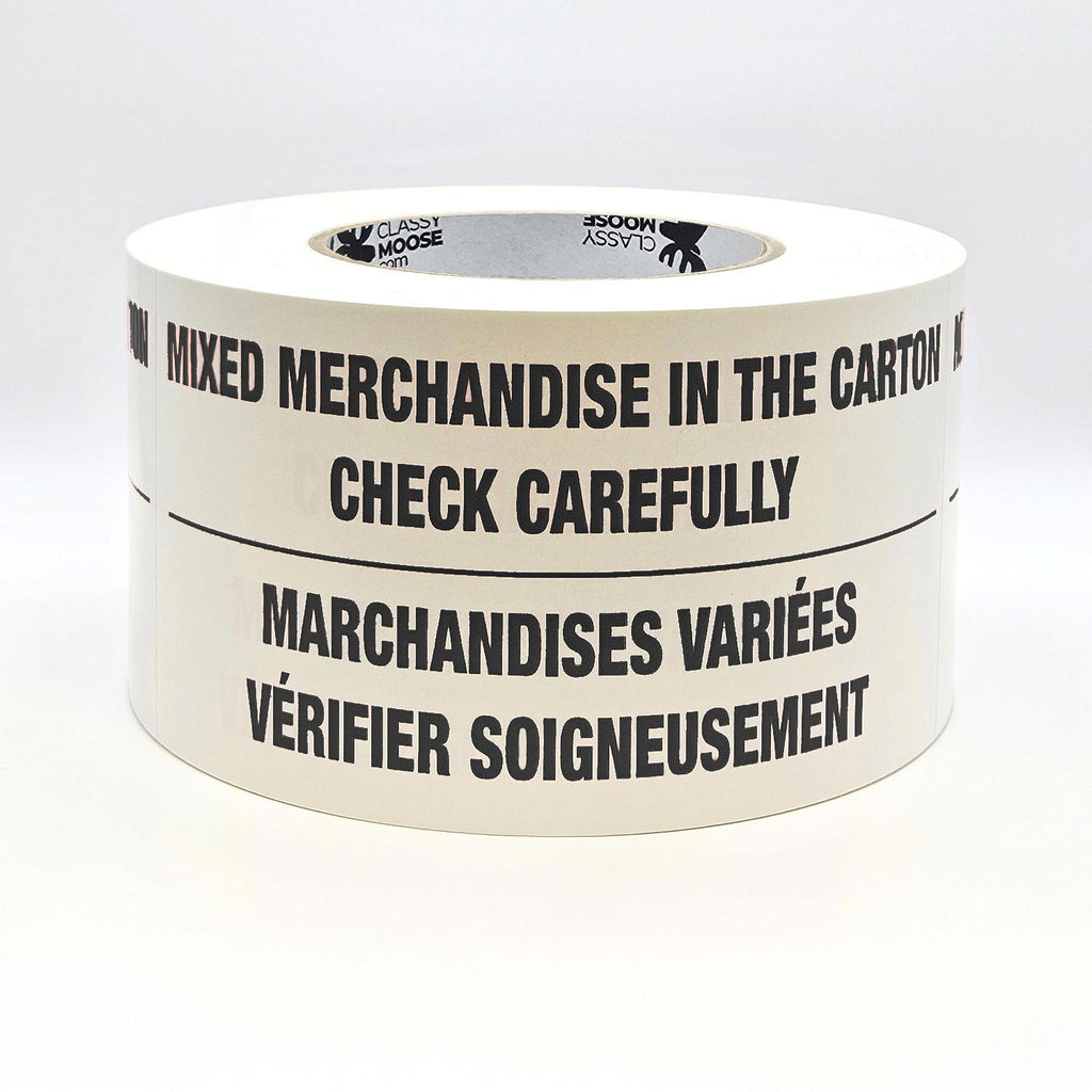 A roll of labels with the text 'MIXED MERCHANDISE IN THE CARTON CHECK CAREFULLY' printed in English and French, indicating bilingual packaging required. Flat view in black