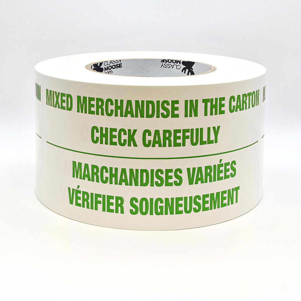 A roll of labels with the text 'MIXED MERCHANDISE IN THE CARTON CHECK CAREFULLY' printed in English and French, indicating bilingual packaging required. Flat view in green