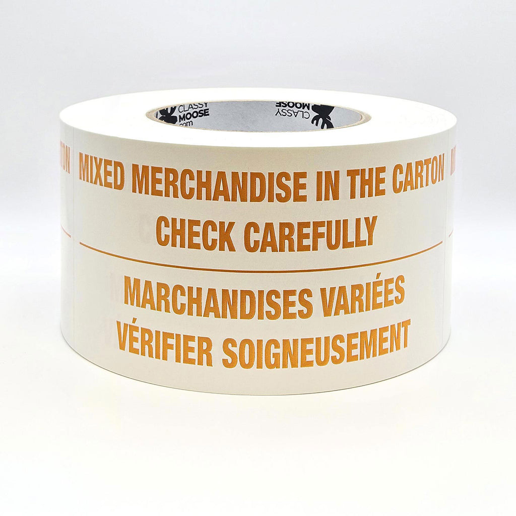 A roll of labels with the text 'MIXED MERCHANDISE IN THE CARTON CHECK CAREFULLY' printed in English and French, indicating bilingual packaging required. Flat view in orange