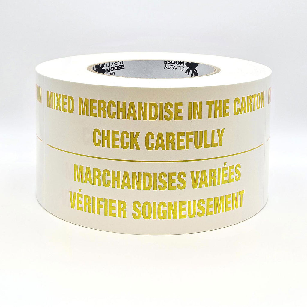 A roll of labels with the text 'MIXED MERCHANDISE IN THE CARTON CHECK CAREFULLY' printed in English and French, indicating bilingual packaging required. Flat view in yellow