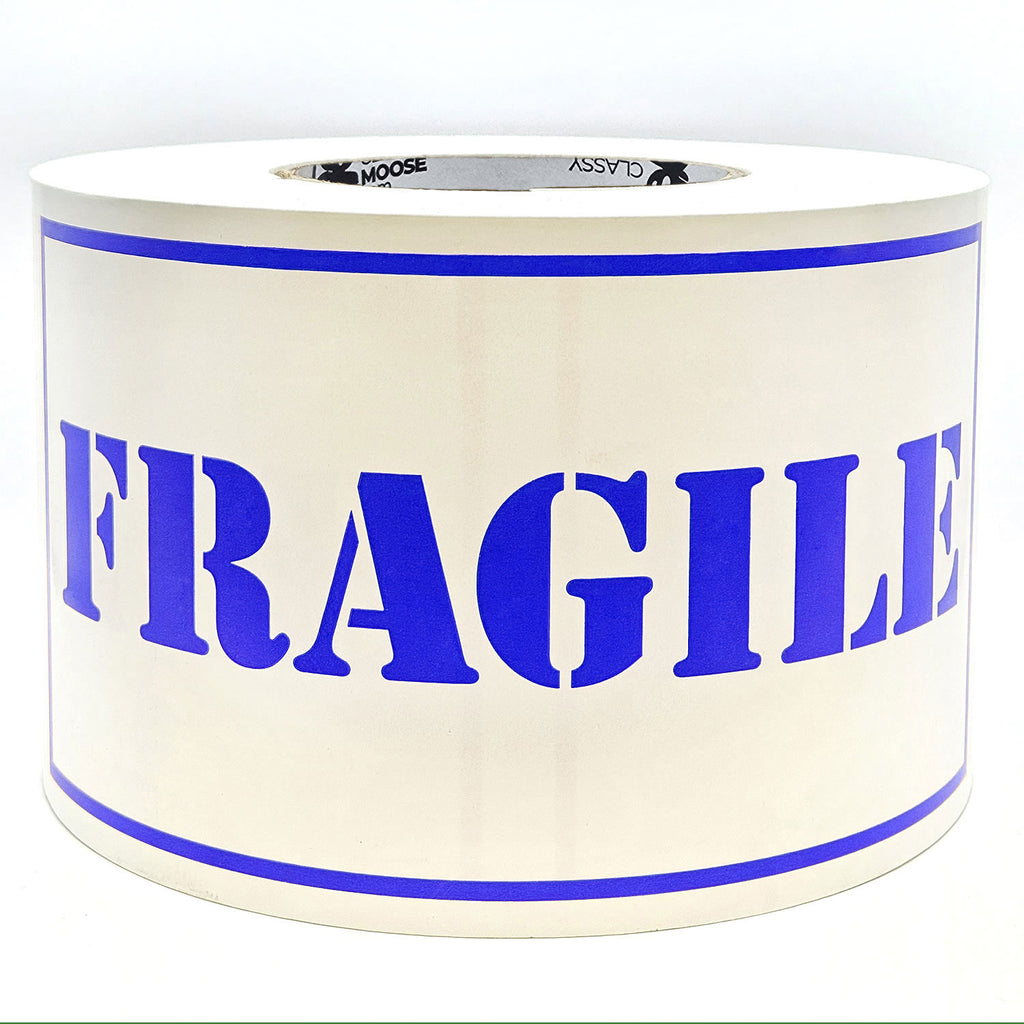 A roll of 'Fragile' sticker labels with the word 'Fragile' printed in blue on a white background with borders.