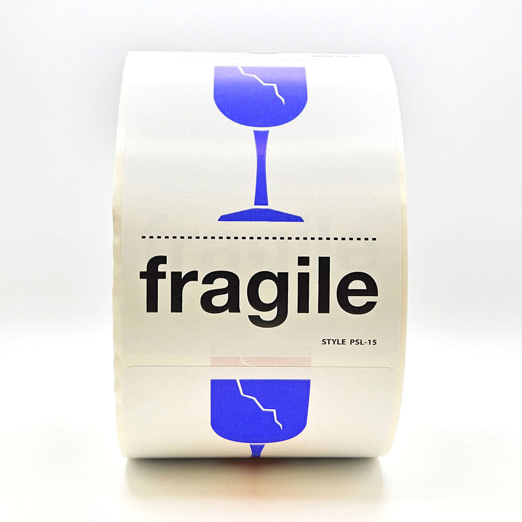 A roll of white labels with 'fragile' text and a broken glass pictogram in blue and black.