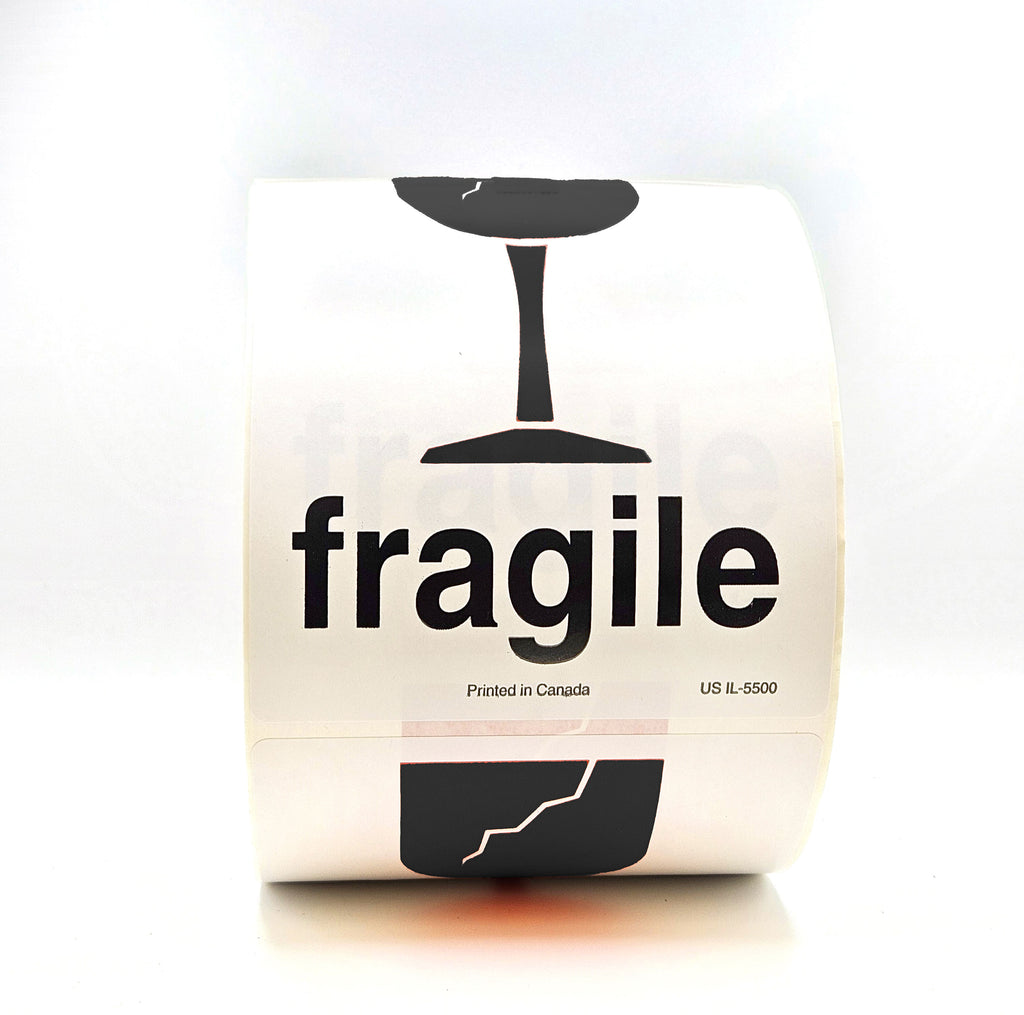 A roll of packing tape with 'fragile' text and a broken glass pictogram printed in black on a white background.