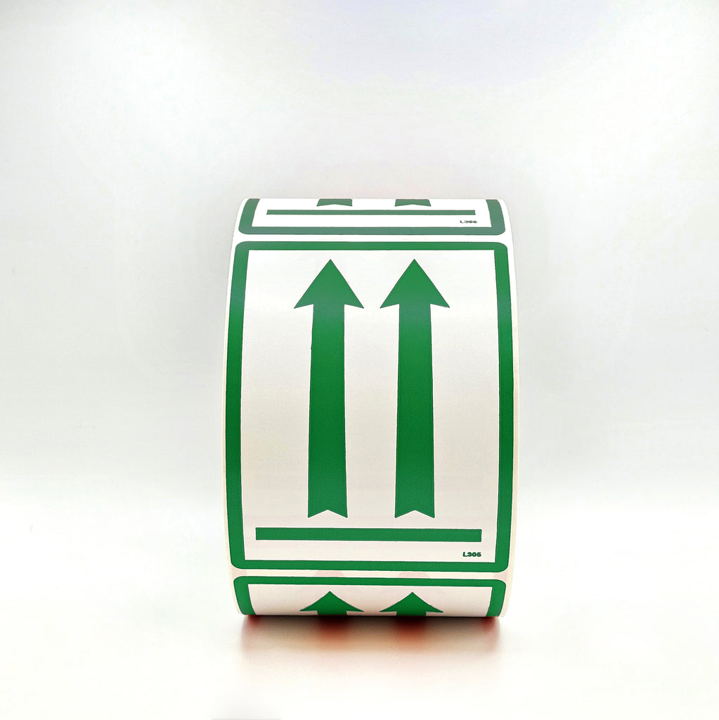 Roll of green and white labels with arrows on a white background