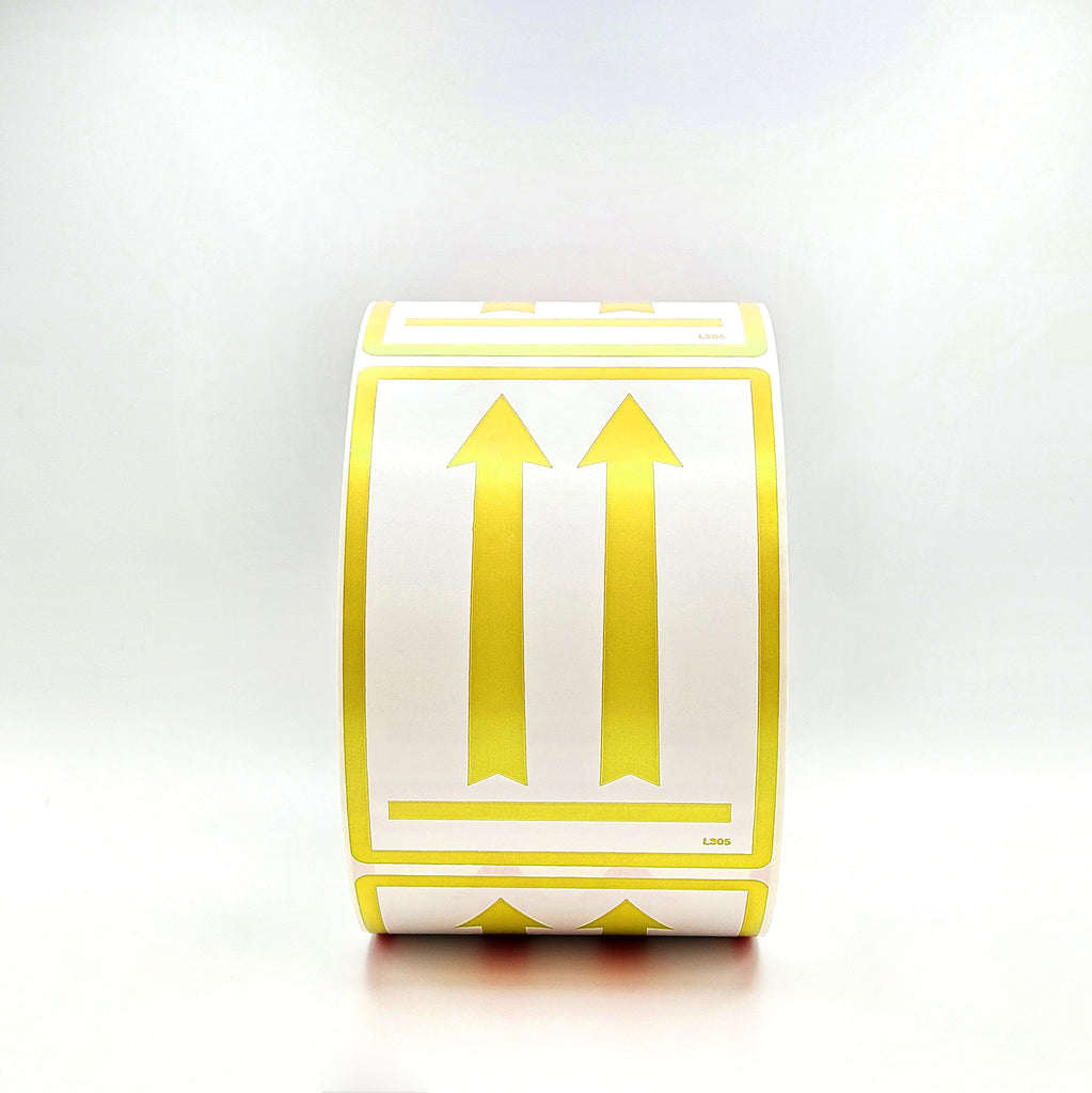 Roll of white labels with yellow arrows on a white background