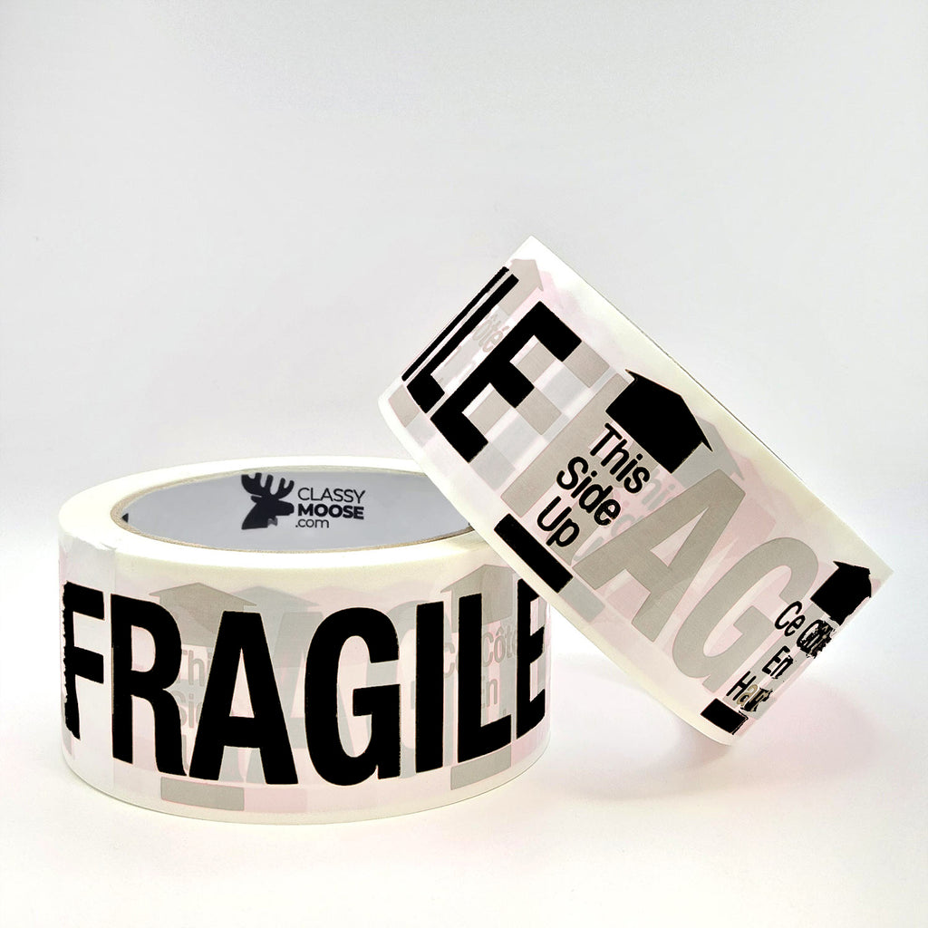 Two rolls of tape with 'FRAGILE' and 'This Side Up' labels on a white background.