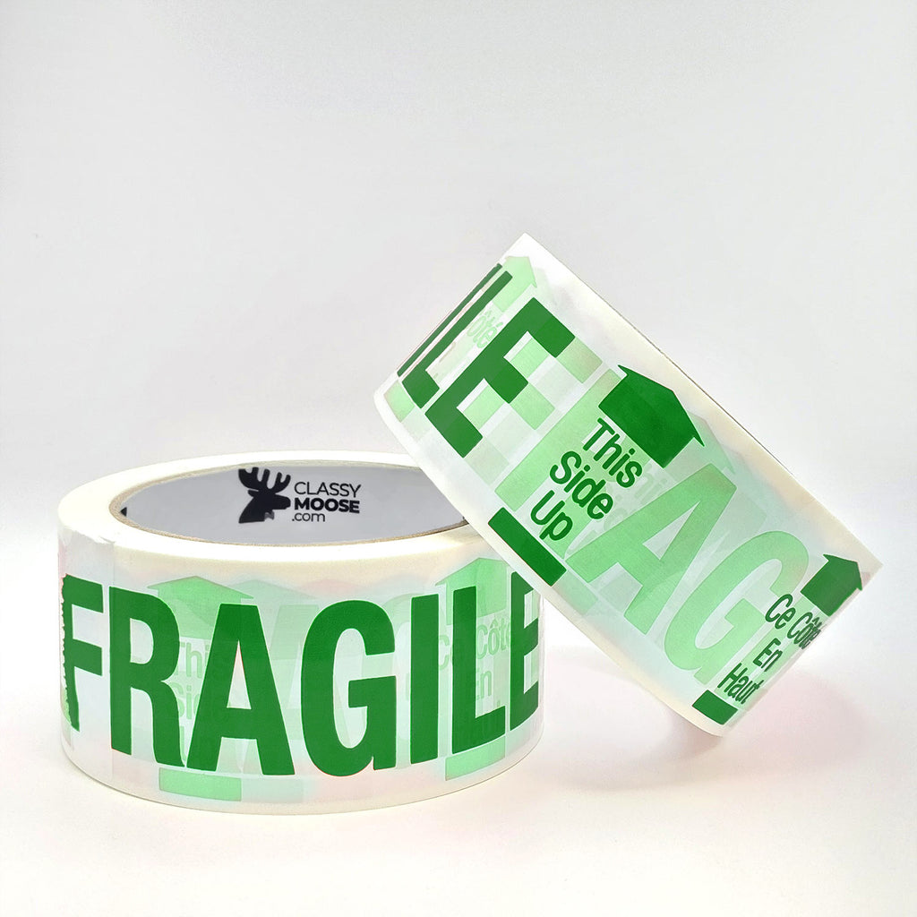 Two rolls of green 'Fragile' tape with Classy Moose branding on a white background