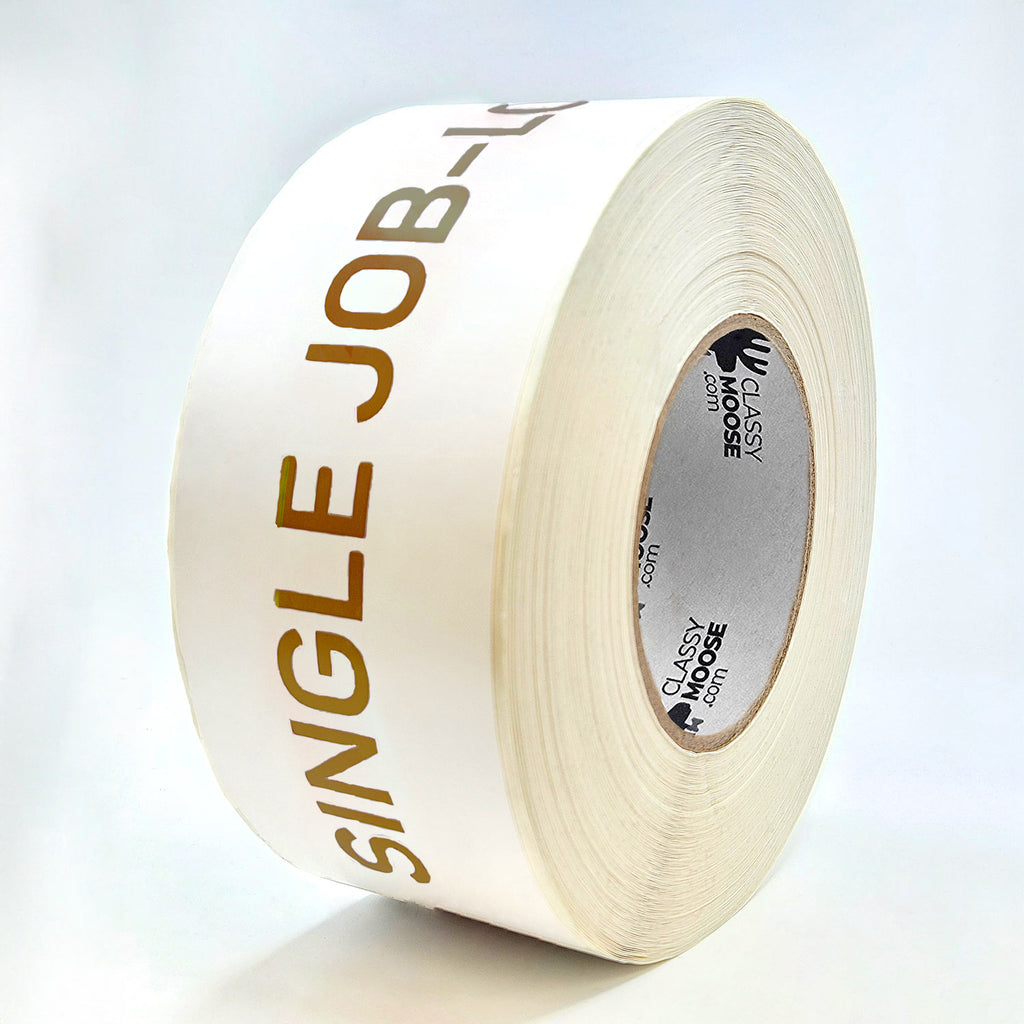 A roll of white and brown labels with the text 'SINGLE JOB-LOT ONLY' printed in red on a white background.