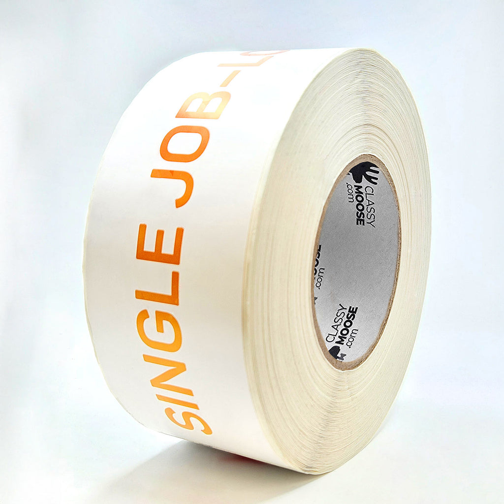 A roll of white and orange labels with the text 'SINGLE JOB-LOT ONLY' printed in red on a white background.