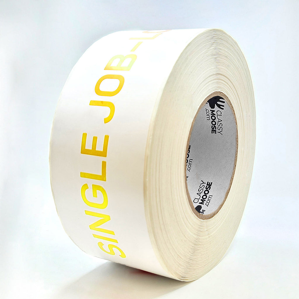 A roll of white and yellow labels with the text 'SINGLE JOB-LOT ONLY' printed in red on a white background.