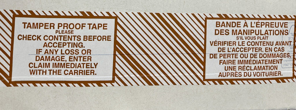 A roll of tamper-proof packing tape with brown text and stripes on a white background, providing instructions to check contents before accepting and report any damage immediately.