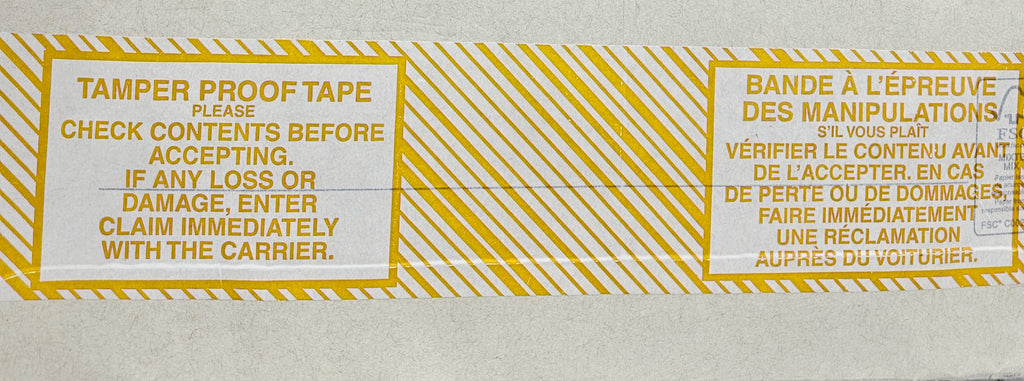 A roll of tamper-proof packing tape with yellow text and stripes on a white background, providing instructions to check contents before accepting and report any damage immediately.