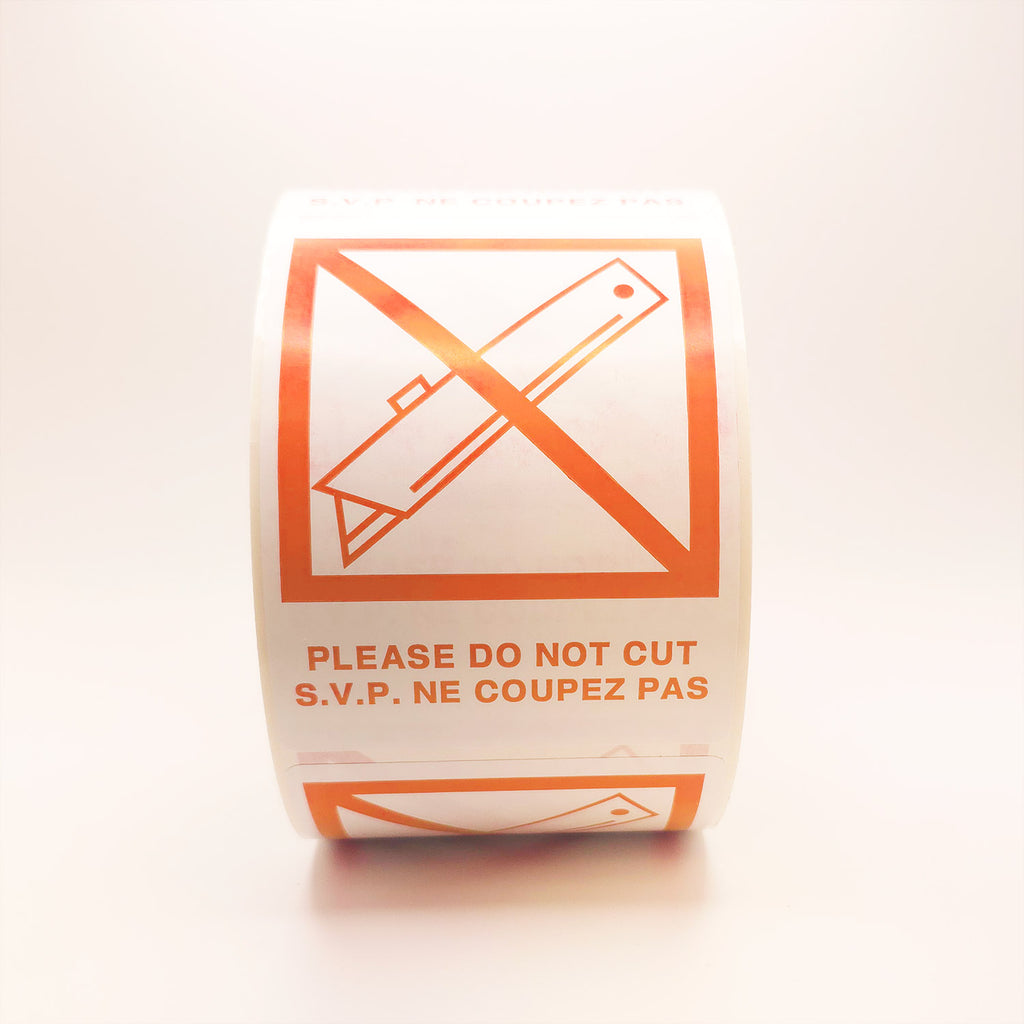 DO NOT CUT with Crossed Out Blade Bilingual Labels front view orange