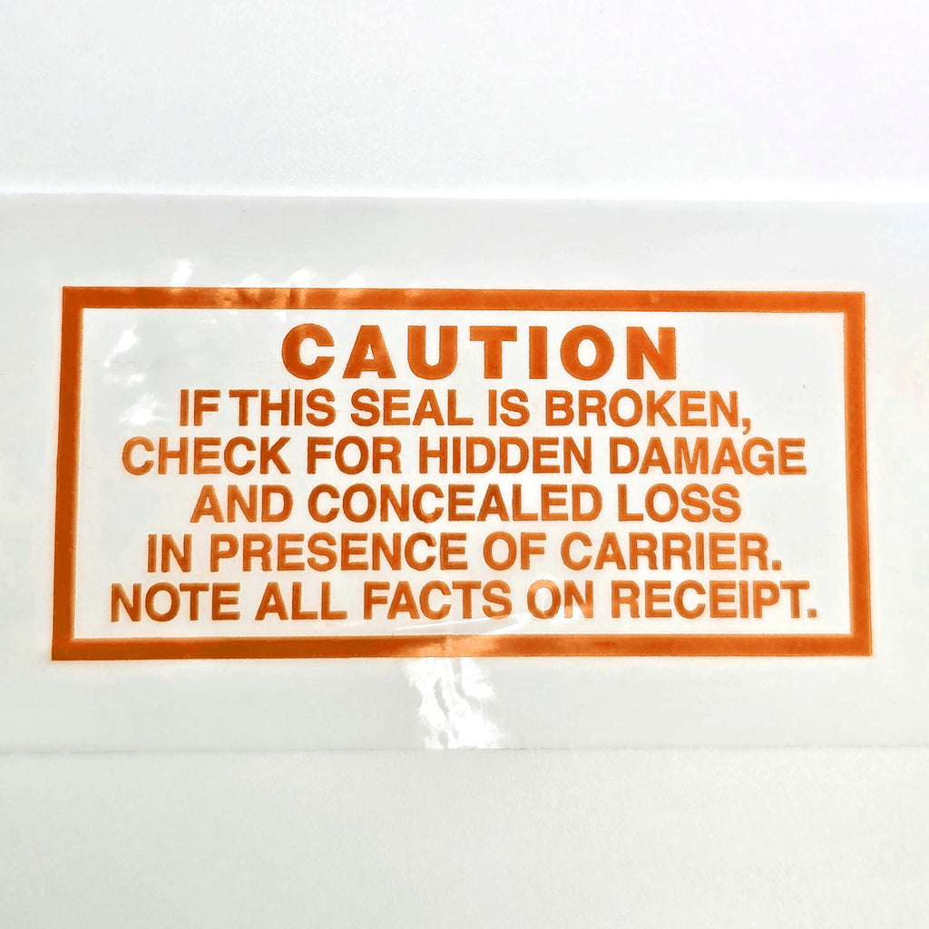 Warning label on a package with text about checking for damage and loss.