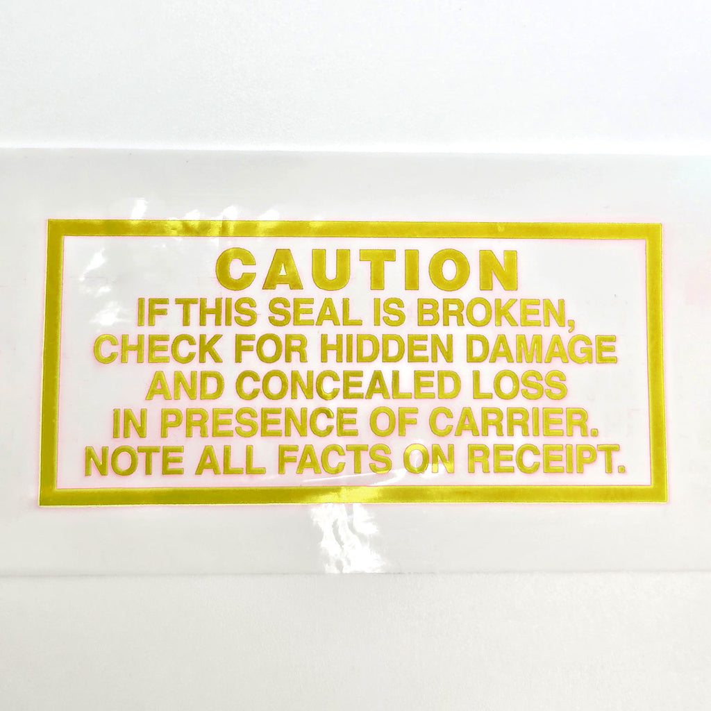 Yellow warning label on a white background with text about checking for damage and loss.