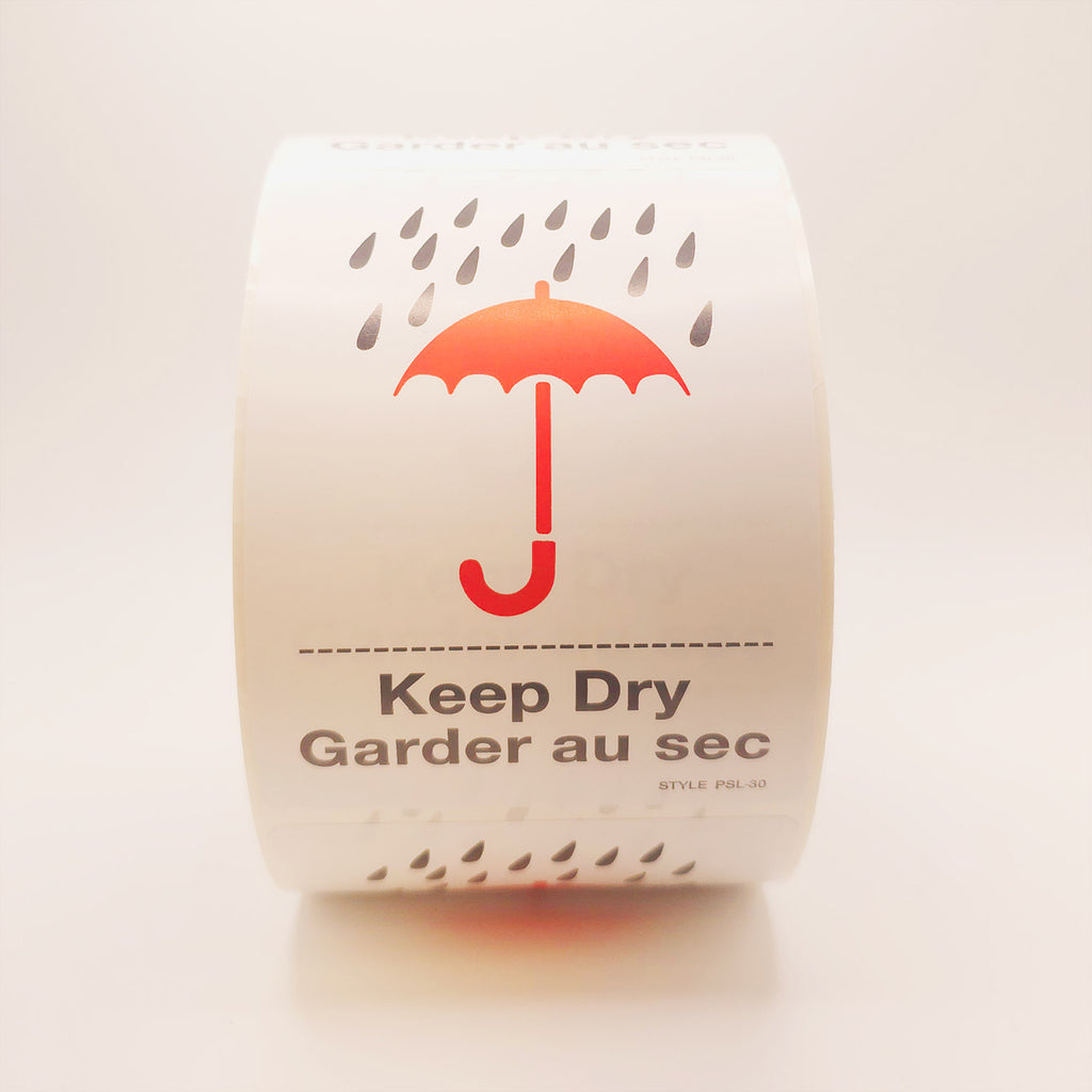 Roll of labels with a red umbrella and raindrop design, labeled 'Keep Dry'. front view