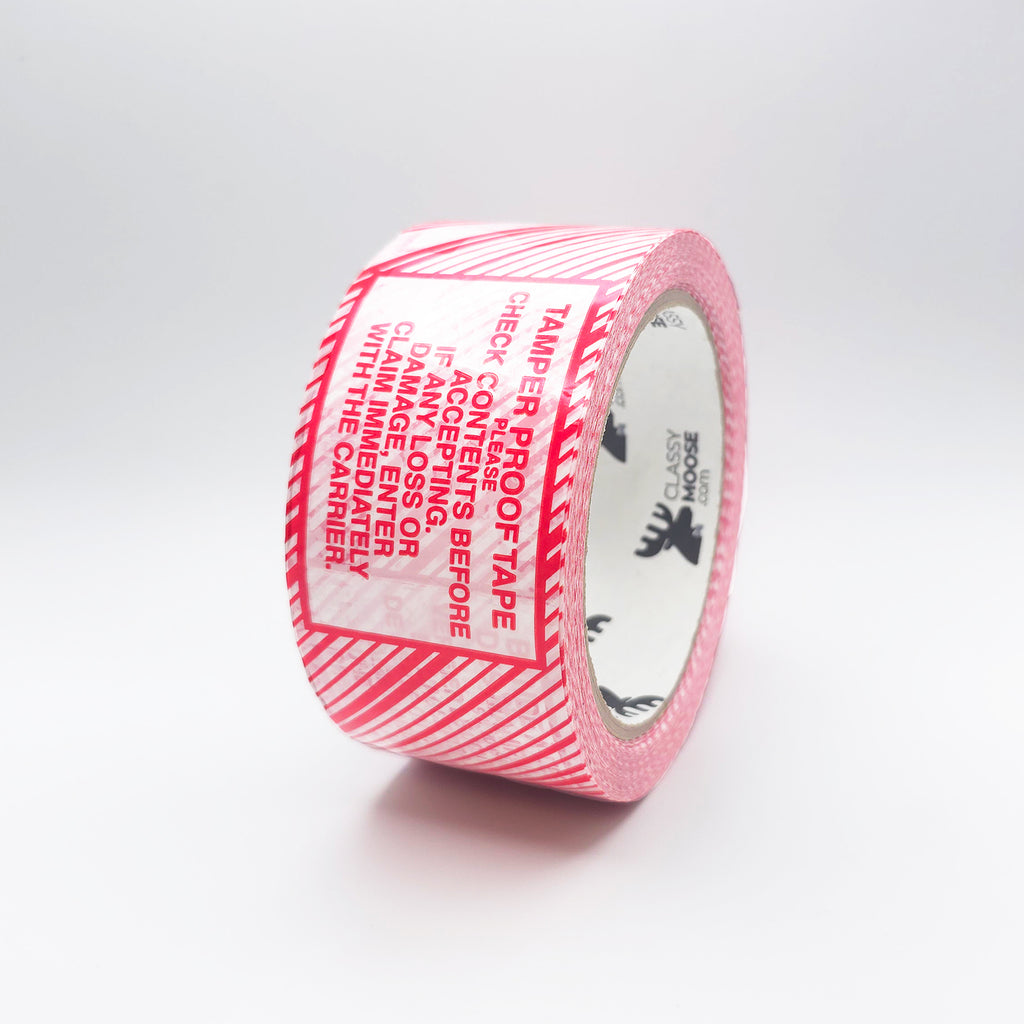 Roll of red tamper-evident tape on a white background