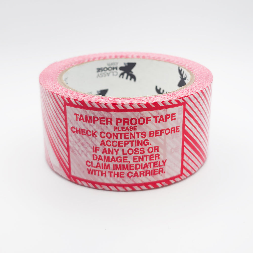 Roll of tamper proof tape with warning label on a white background
