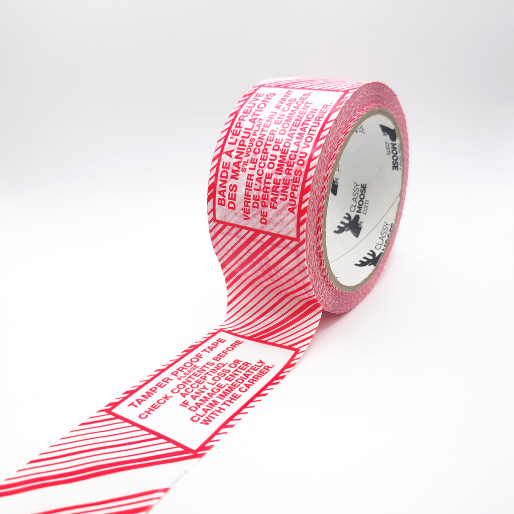 Roll of red and white tape with text on a white background